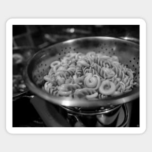 Pasta draining in a colander Sticker